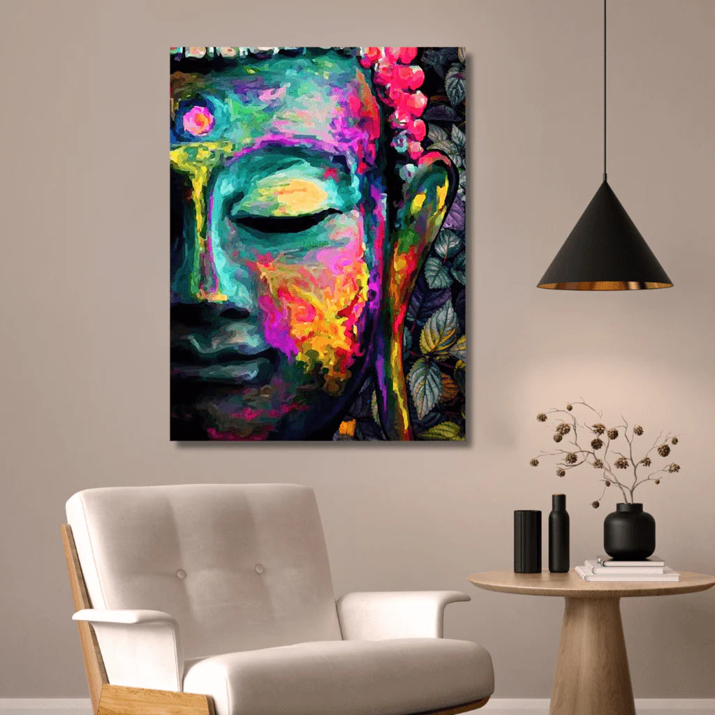 Vibrant wall art canvas featuring a colorful, abstract portrait of Buddha in a serene expression with closed eyes, rendered in bold strokes of pink, yellow, blue, and green, set against a dark leafy background.